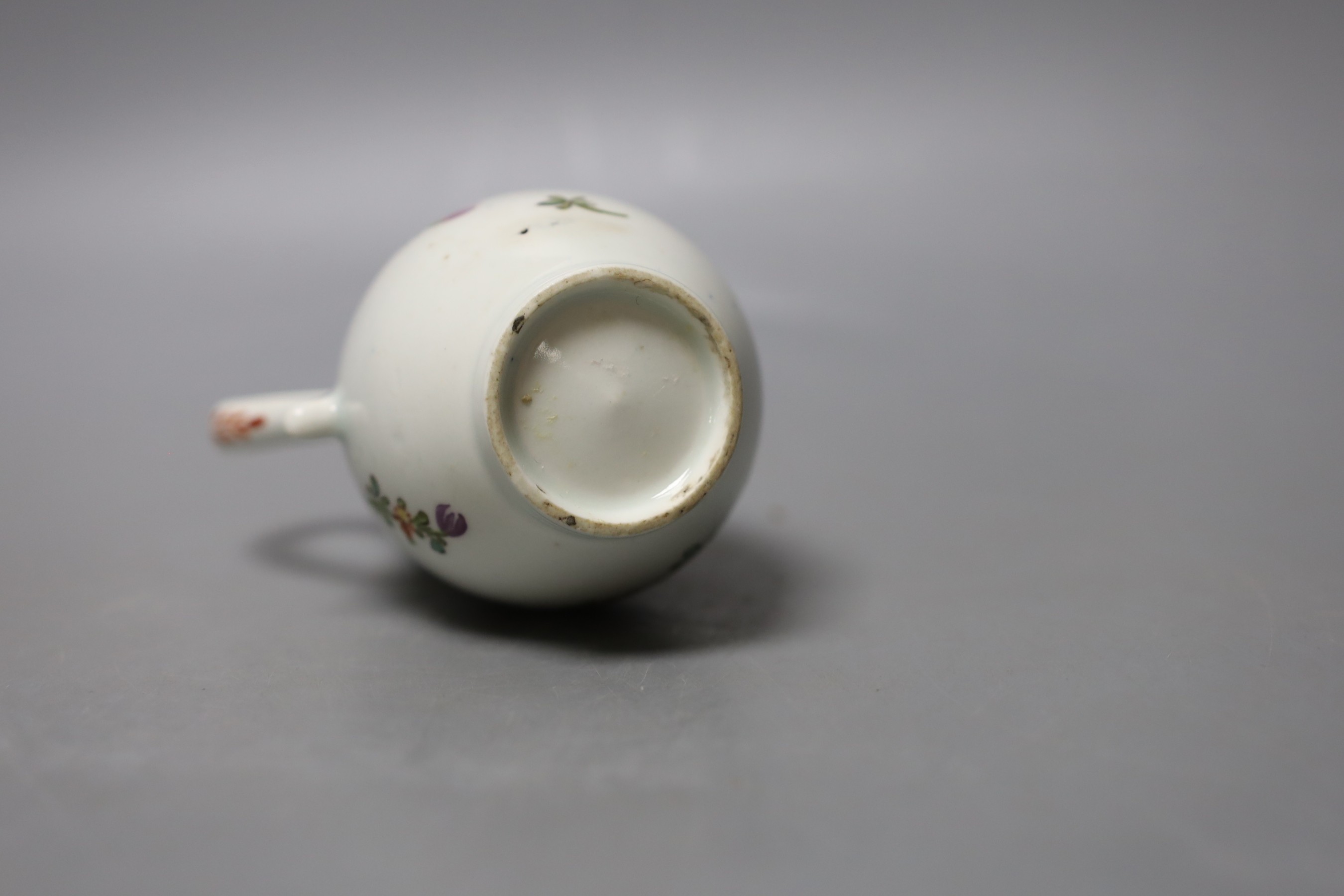 Lowestoft sparrow beak jug painted with a floral spray and scattered sprigs c.1780 - 9.5cm high